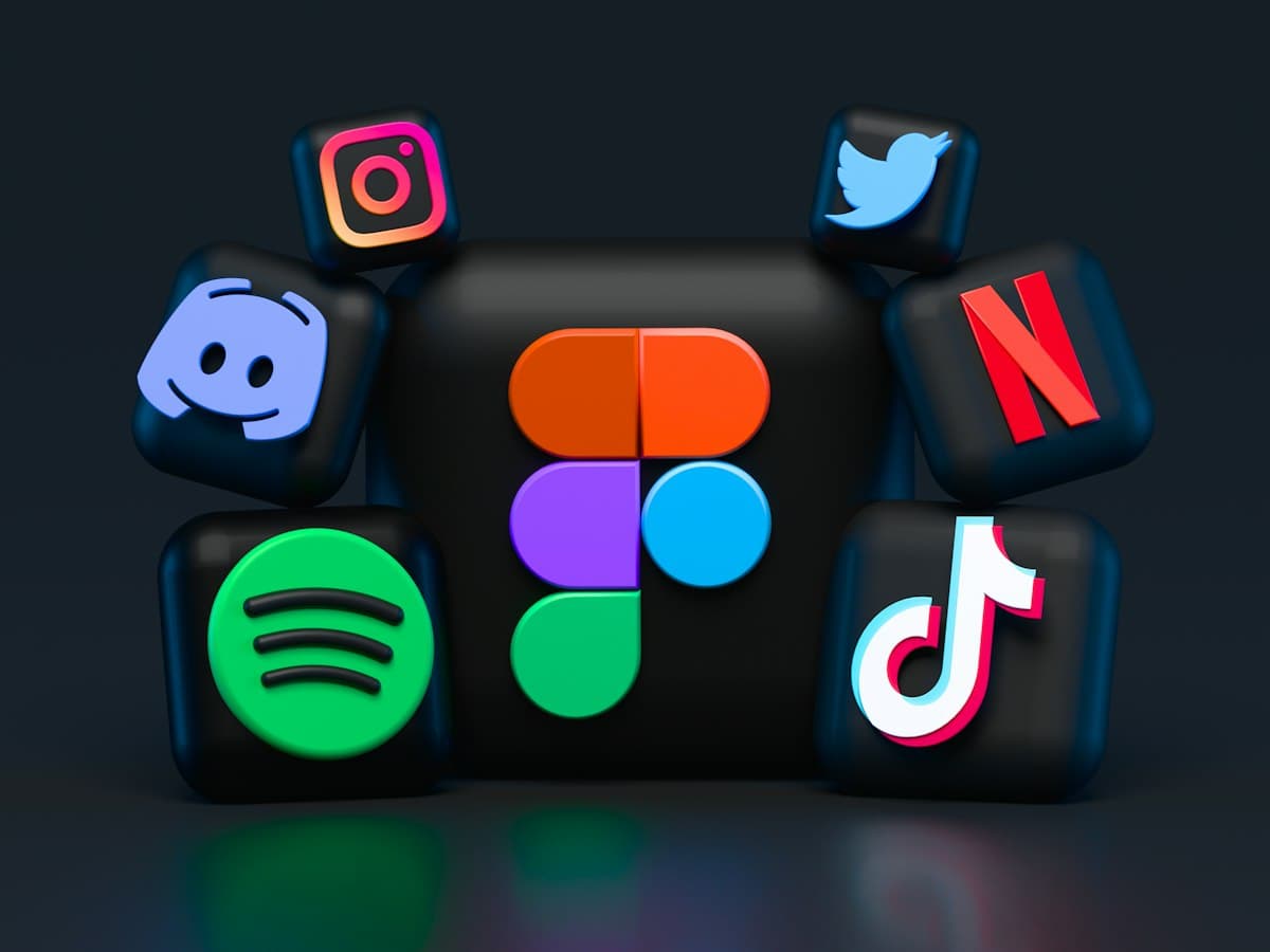 Smartphone displaying video streaming recommendations on a clean creator workspace