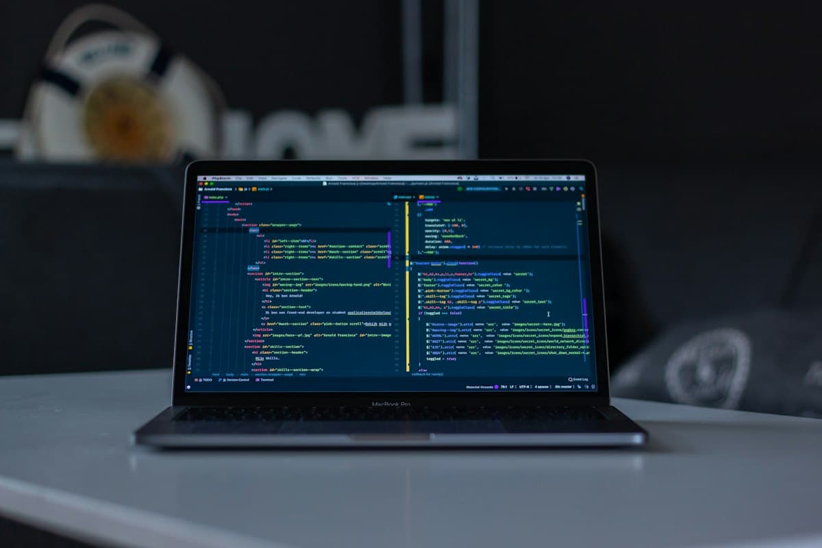 Code editor displaying dark mode styles and CSS variables