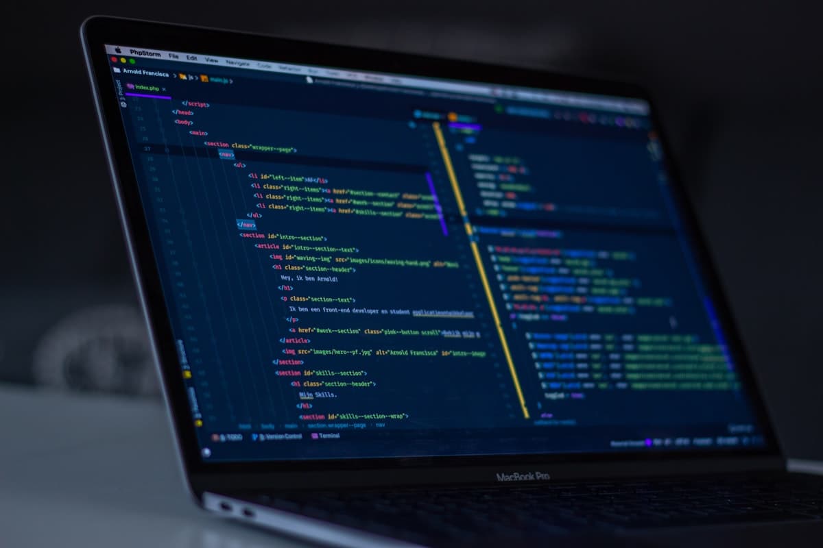Lines of code and binary data displayed on a developer monitor