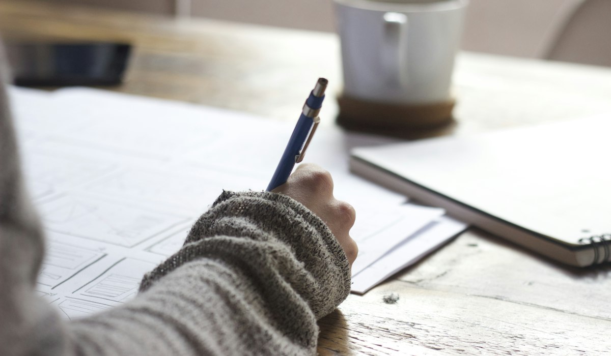Detailed mathematical formulas and financial calculations on paper