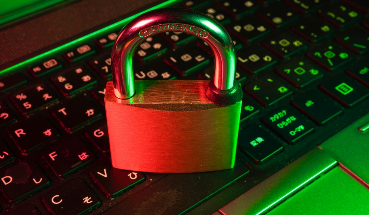 Encrypted laptop keyboard with hardware security authentication token