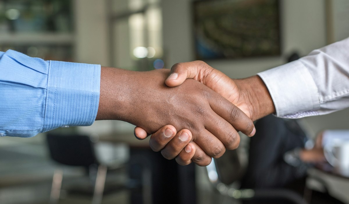 Hiring managers reviewing candidate qualifications and skill scores